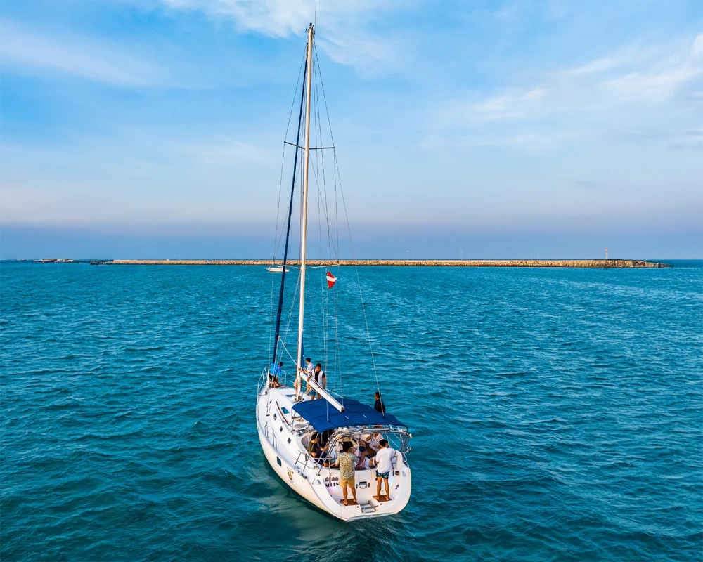 SAILBOAT BENETEAU ANCHORED.